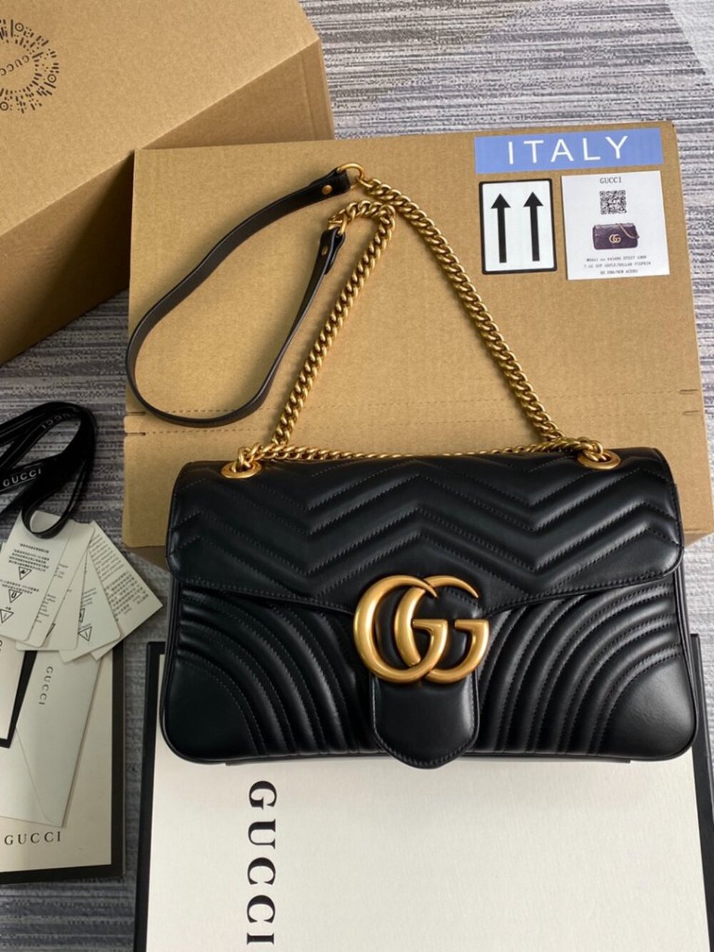 Black Gucci GG Marmont quilted black leather flap bag Gucci Marmont flap bag